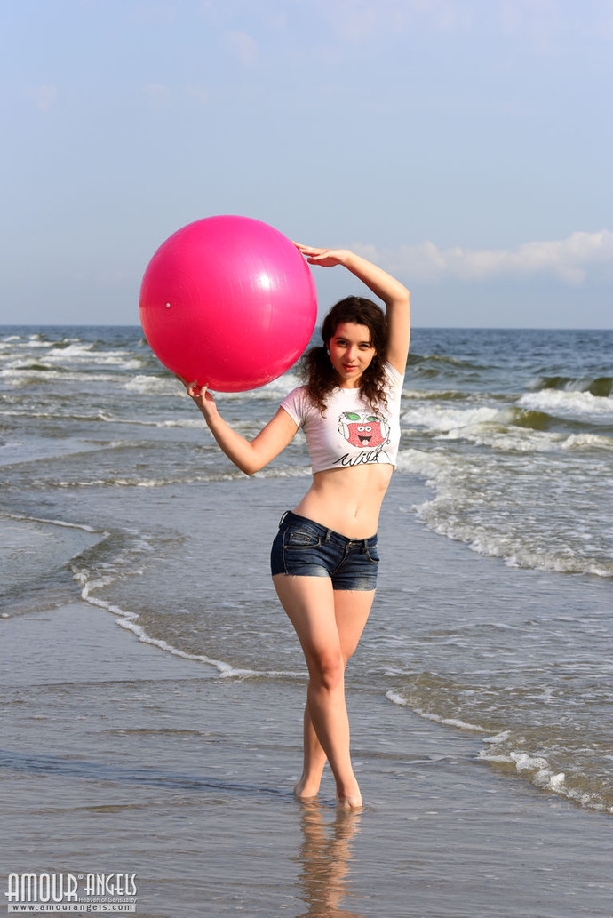 Cute angel on the beach 00