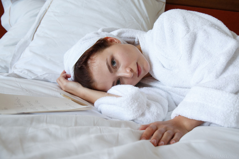 Berenice relaxes on her bed  02